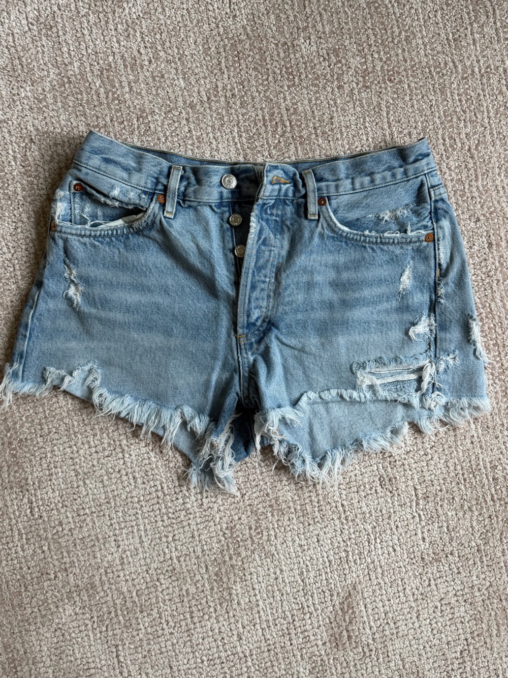 Agolde Distressed Light Blue Denim Cutoff Shorts